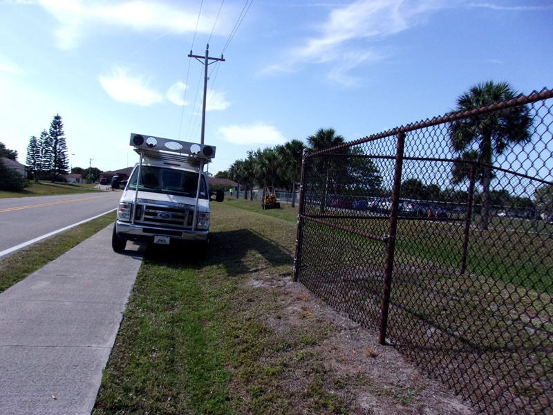 P&T Irrigation and Lighting Truck in front of a Lee County School